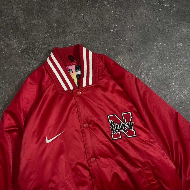 90s Vintage Nike Satin Varsity Jacket  Nebraska Huskers (M)